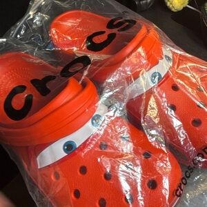CROCS Bright Orange Classic Clog with Eye Graphic
